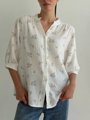 Muslin shirt flower with blue leaf on milky