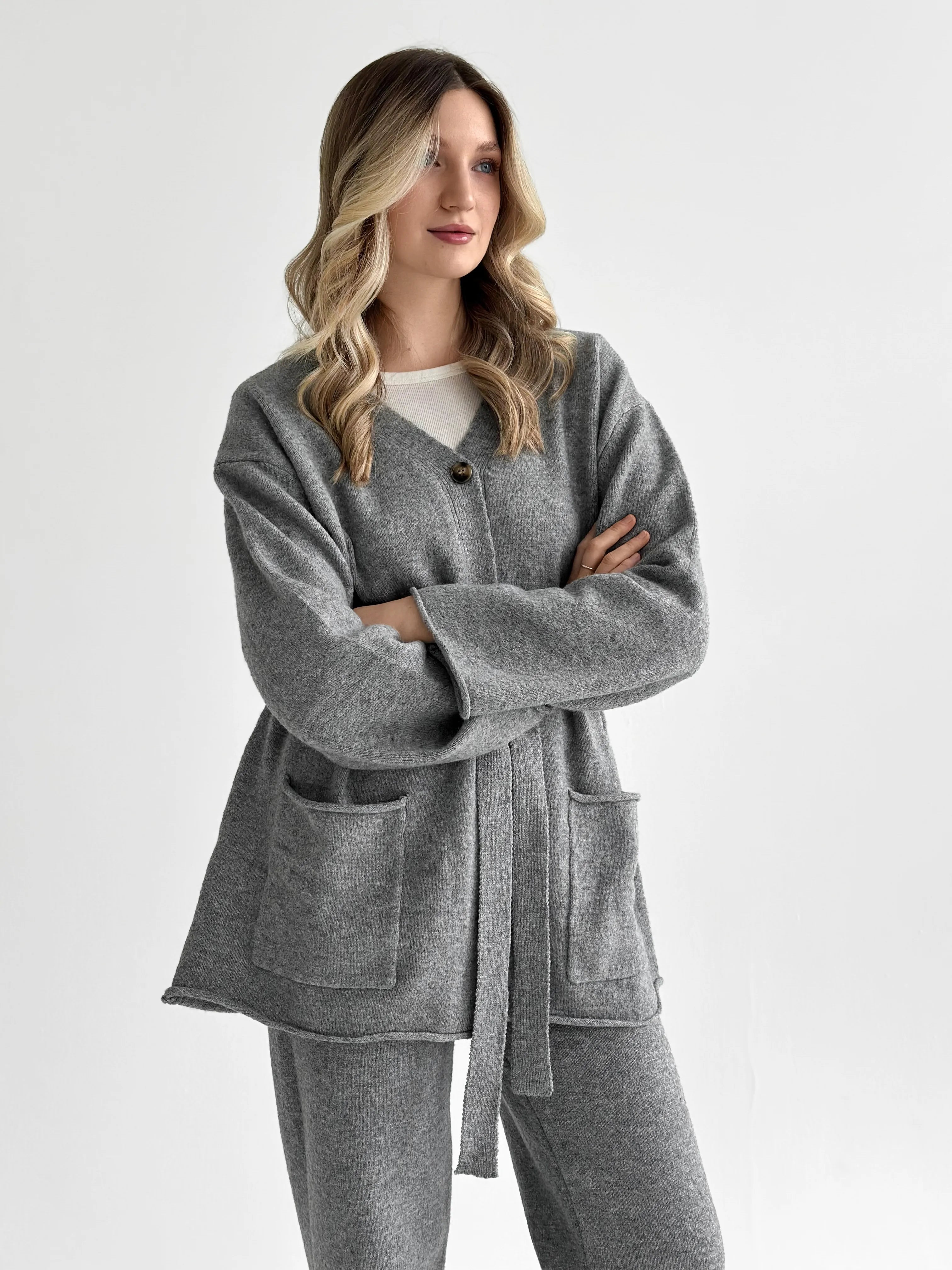 Set knitted cardigan with belt and gray pants