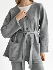 Set knitted cardigan with belt and gray pants