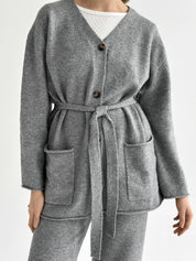Set knitted cardigan with belt and gray pants