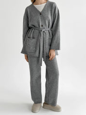 Set knitted cardigan with belt and gray pants