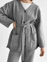 Set knitted cardigan with belt and gray pants