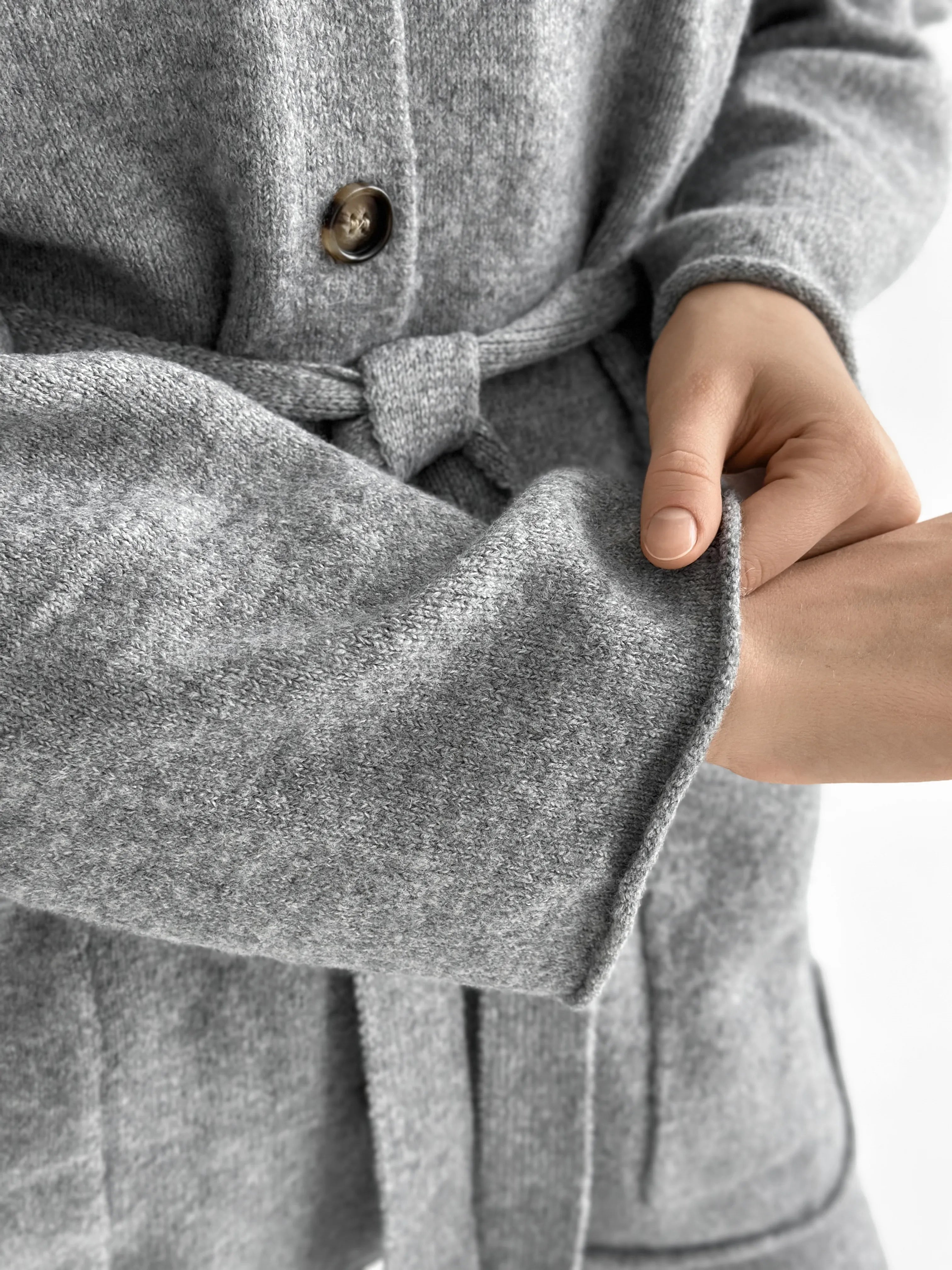 Set knitted cardigan with belt and gray pants