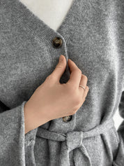 Set knitted cardigan with belt and gray pants