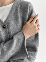 Set knitted cardigan with belt and gray pants