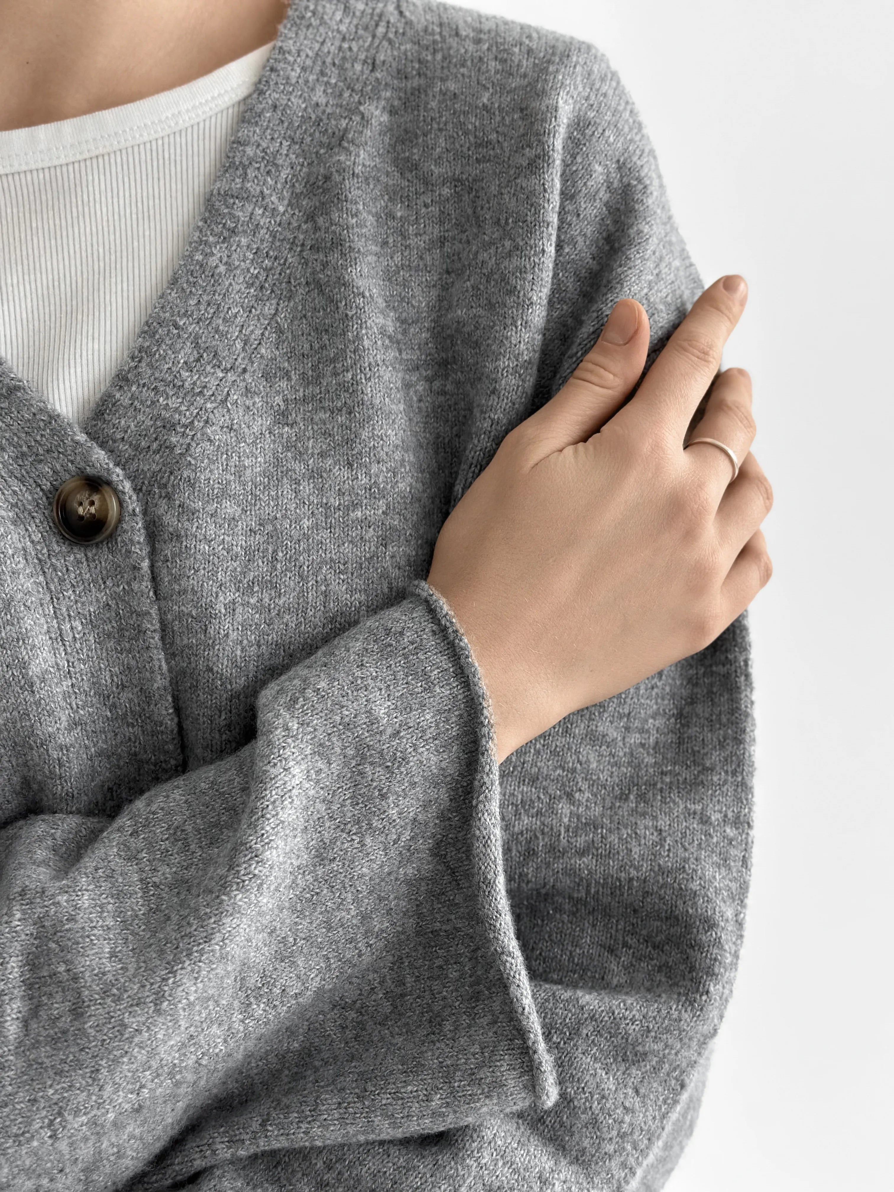 Set knitted cardigan with belt and gray pants
