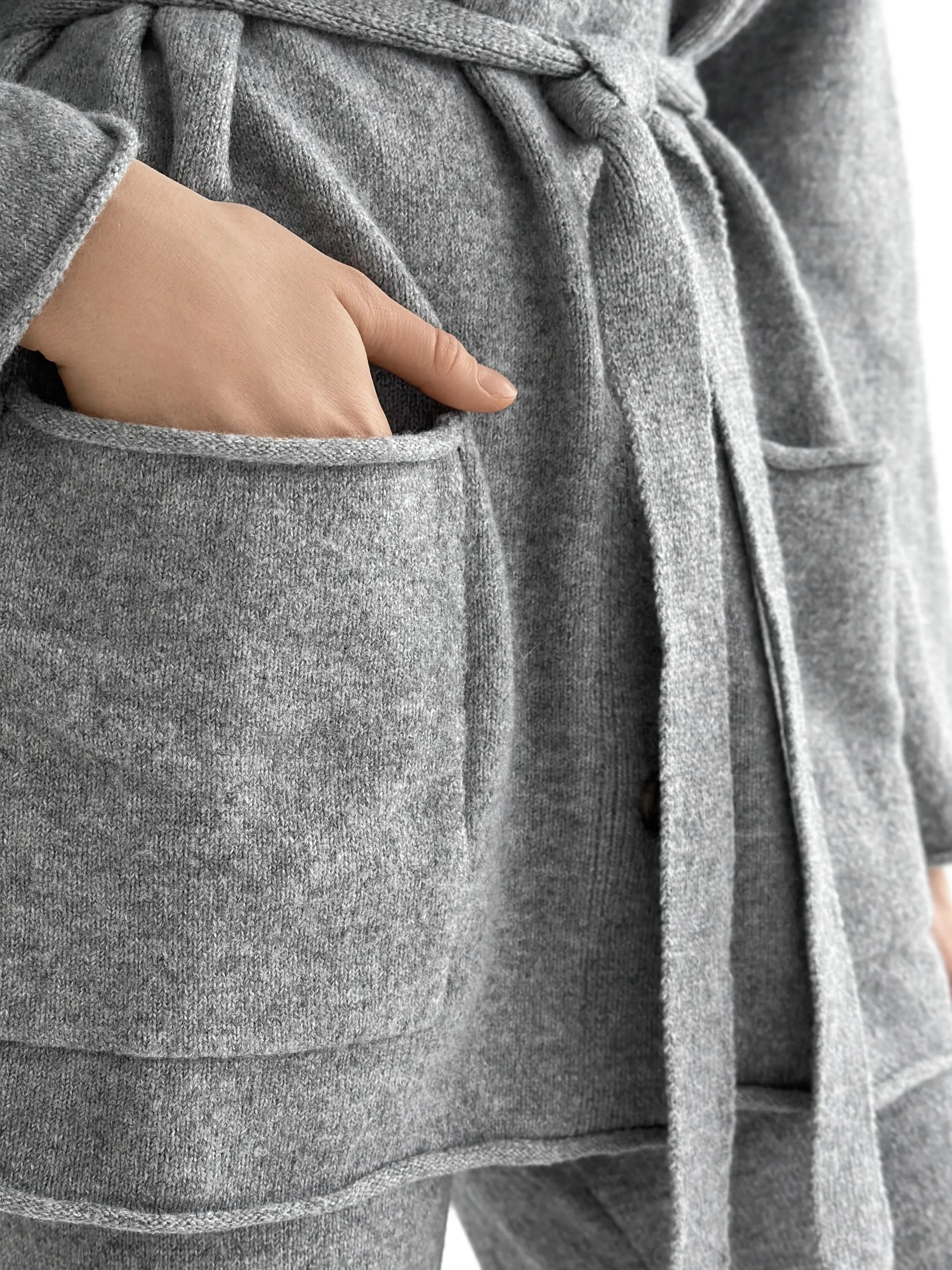 Set knitted cardigan with belt and gray pants