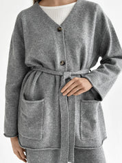 Set knitted cardigan with belt and gray pants