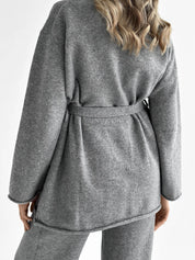 Set knitted cardigan with belt and gray pants