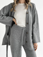 Set knitted cardigan with belt and gray pants