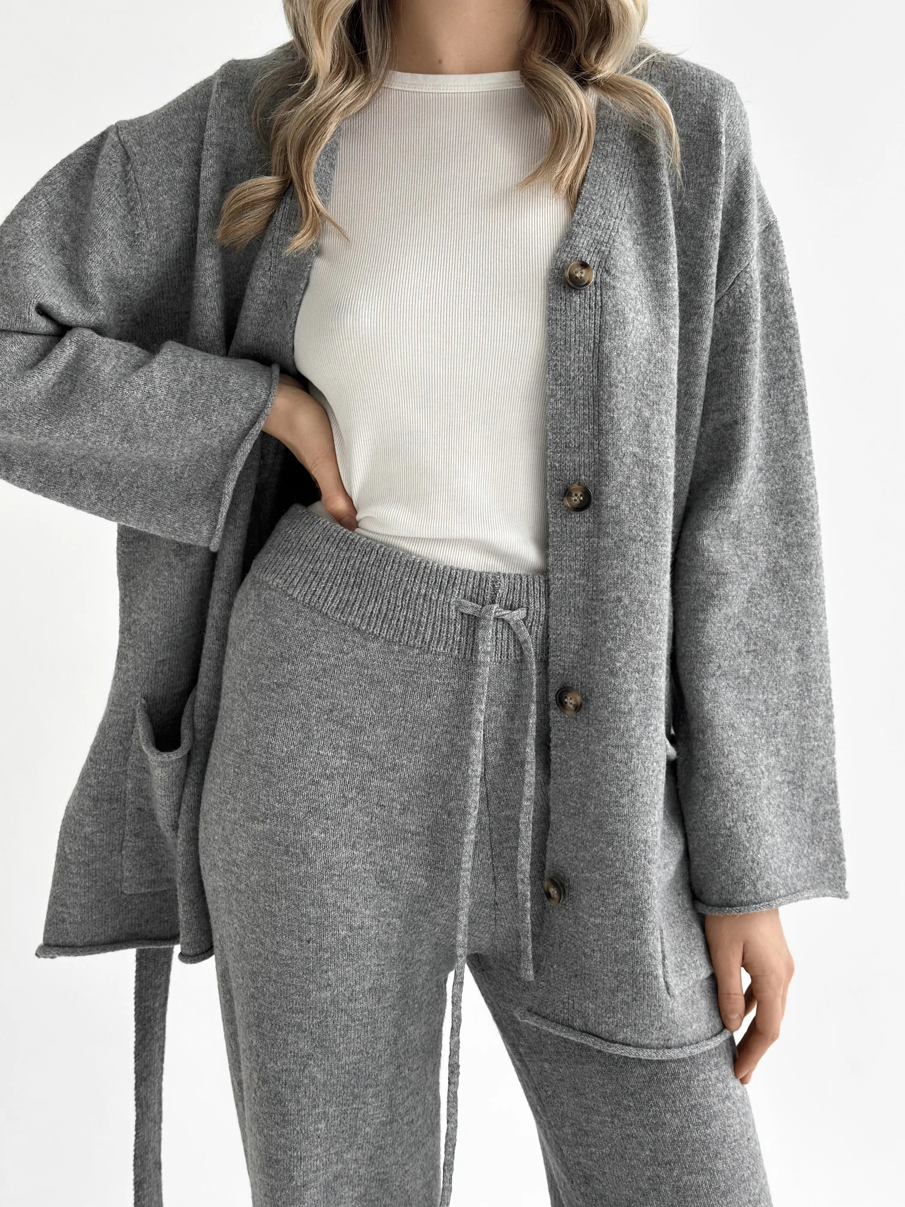 Set knitted cardigan with belt and gray pants