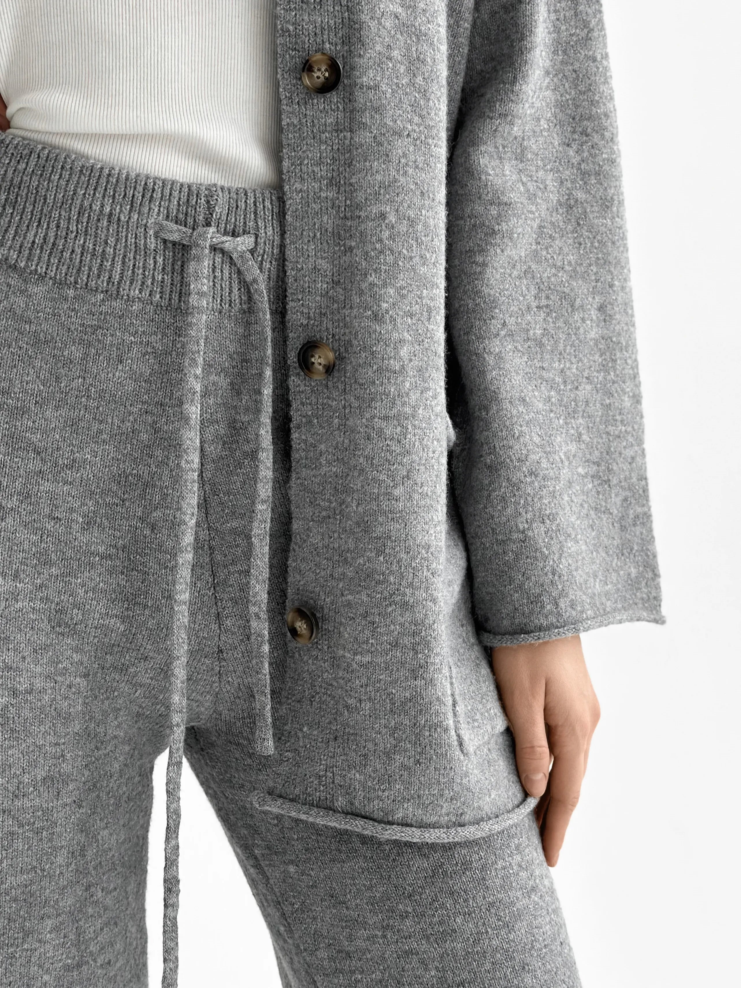 Set knitted cardigan with belt and gray pants