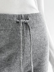 Set knitted cardigan with belt and gray pants