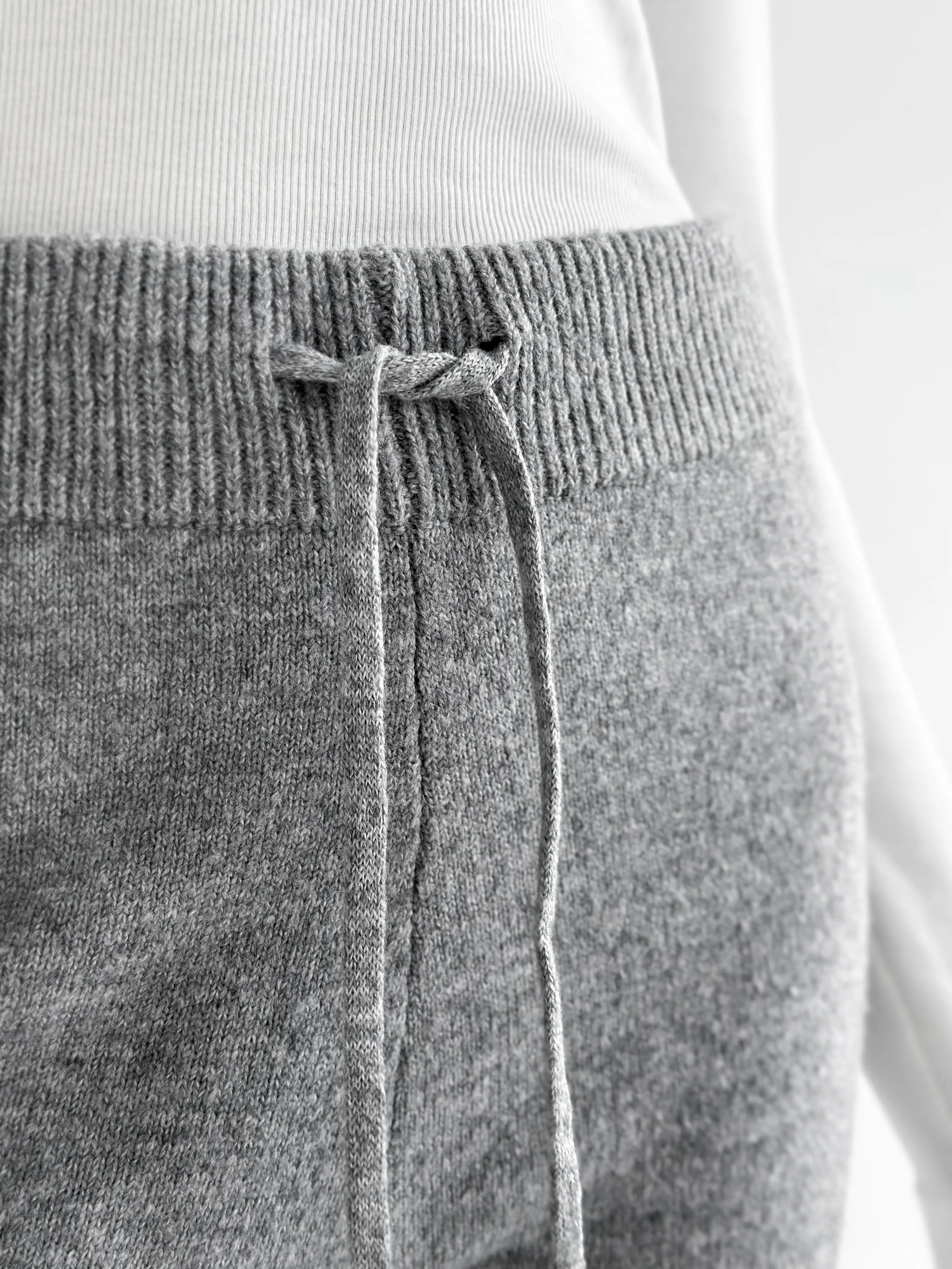 Set knitted cardigan with belt and gray pants