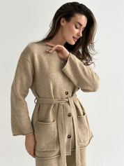 Set knitted cardigan with belt and beige pants