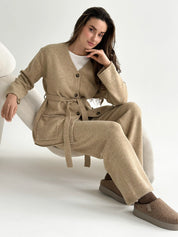 Set knitted cardigan with belt and beige pants