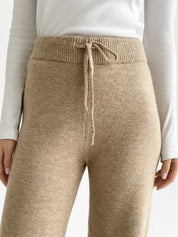 Set knitted cardigan with belt and beige pants