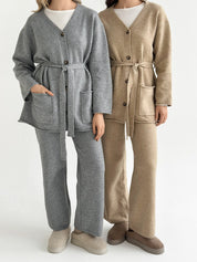Set knitted cardigan with belt and gray pants