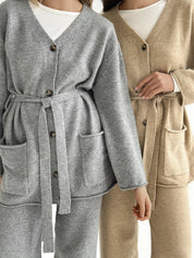Set knitted cardigan with belt and gray pants