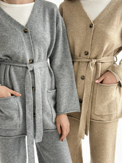 Set knitted cardigan with belt and gray pants