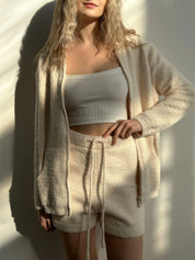 Soft knitted sweater with zipper milky