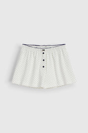 Knitted shorts with a gull in blue polka dots