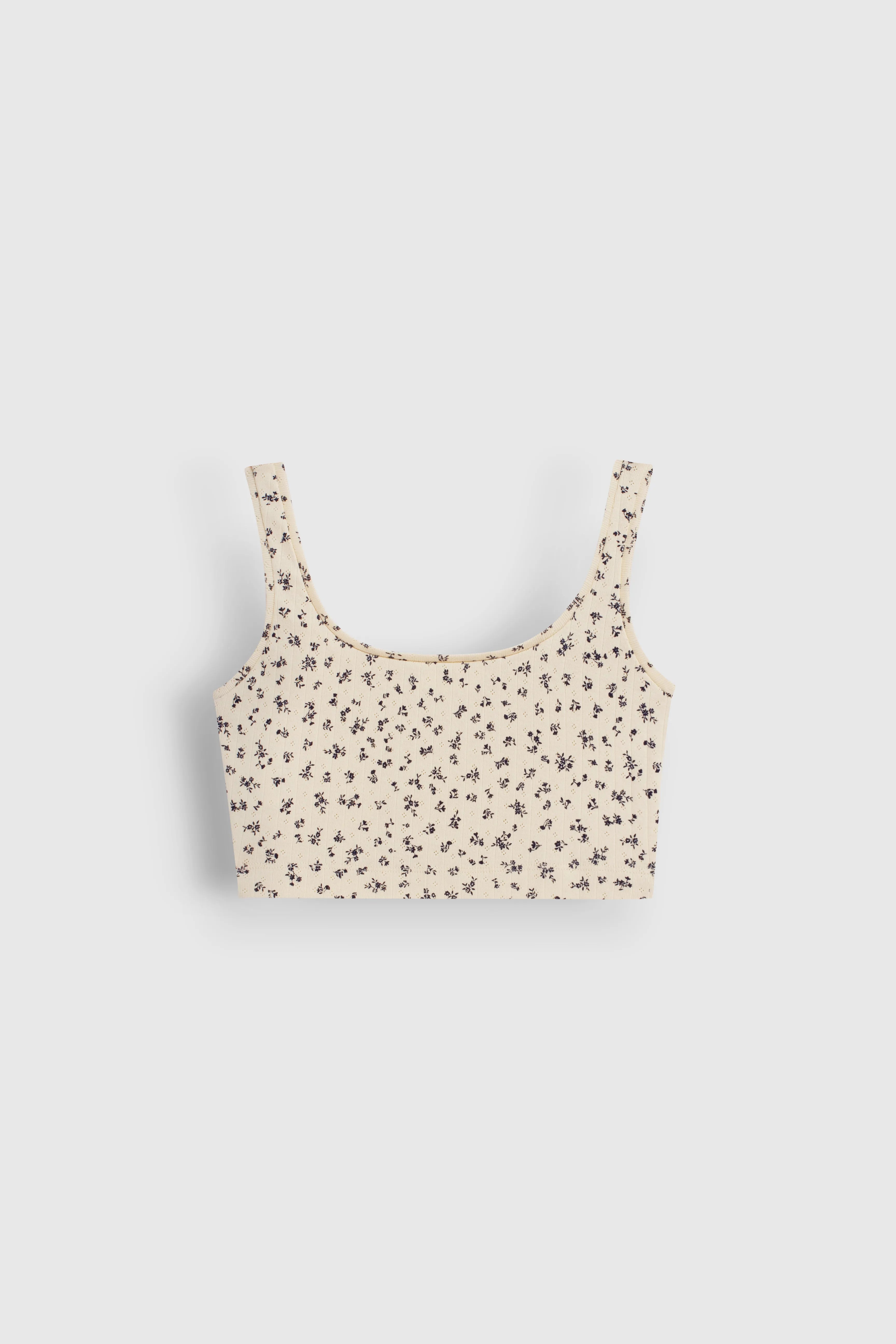 Ribbed mini top in milky blue with a little flower