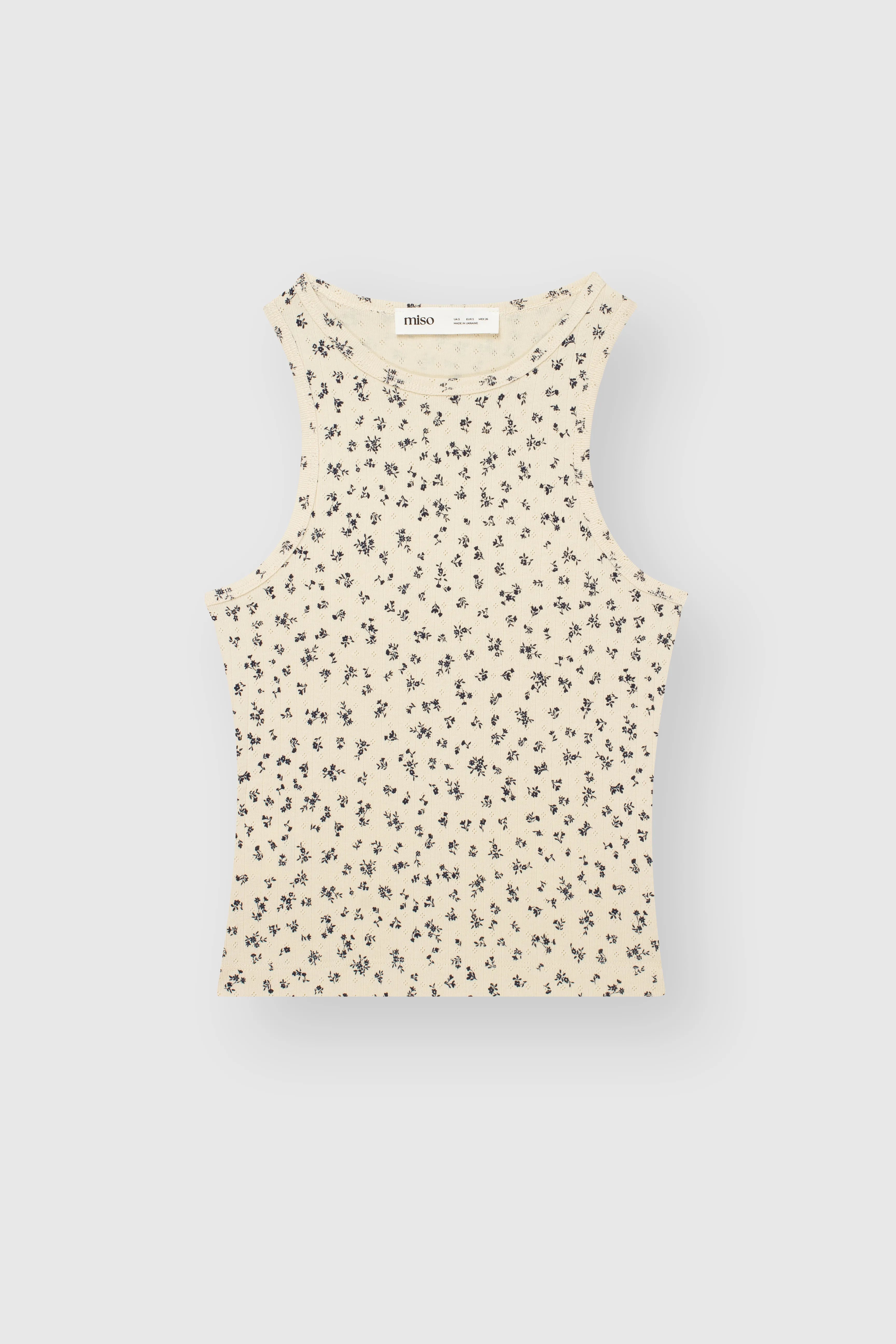 Ribbed T-shirt milk color with a blue flower